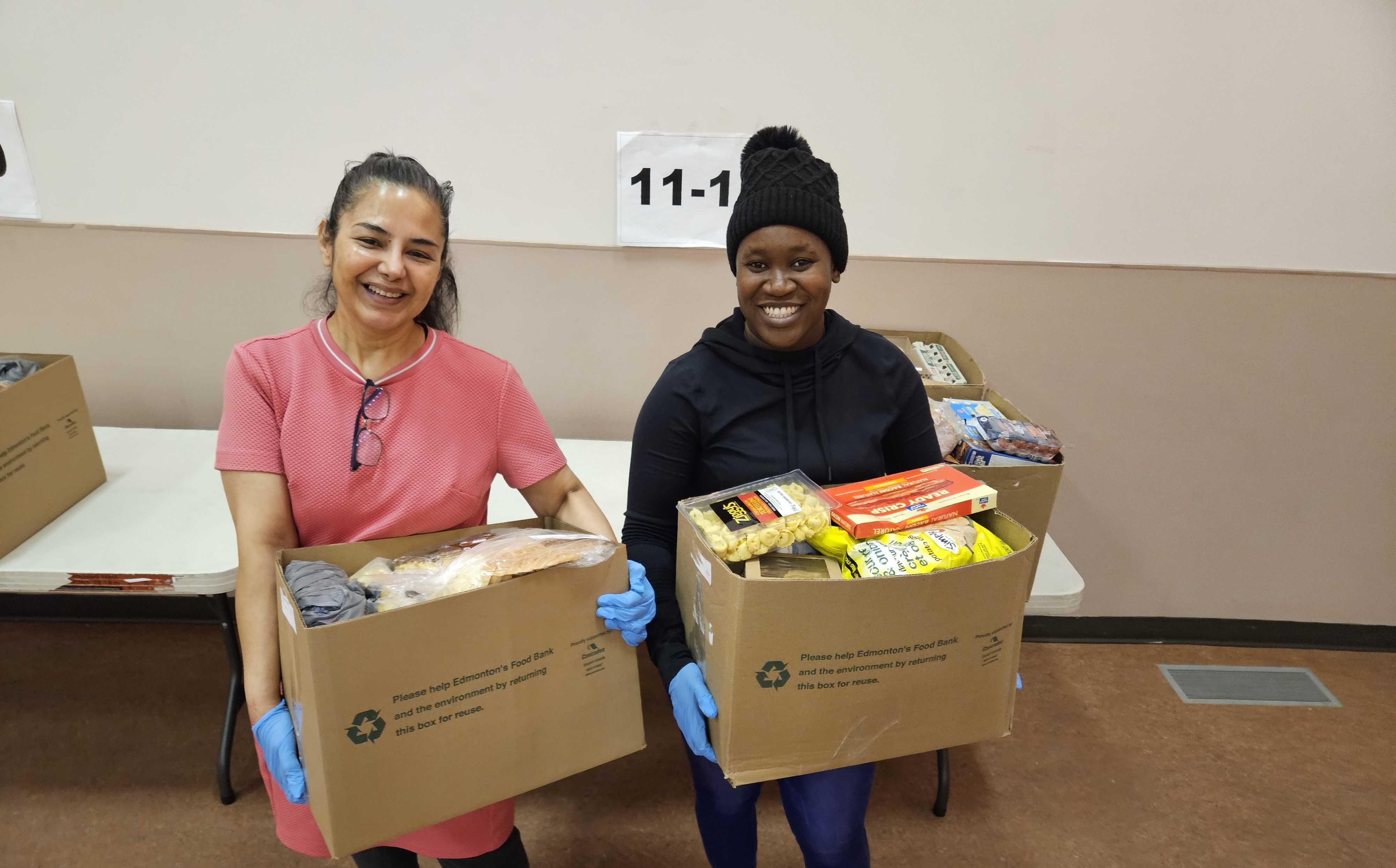 Clients receiving food hampers
