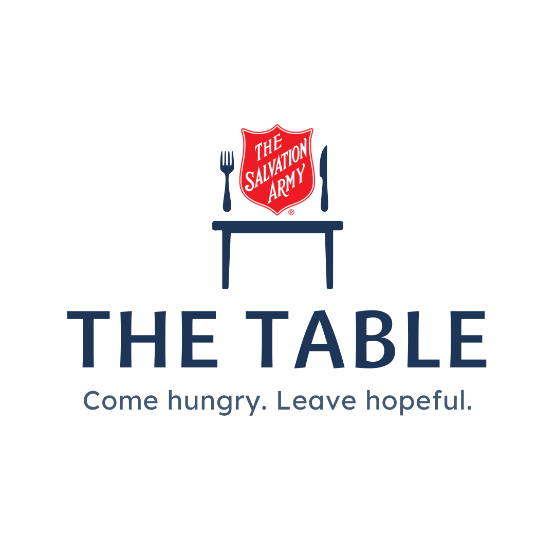 The Table logo with tag line come hungry, leave hopeful.